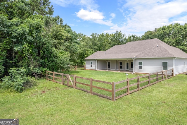 104 Bonny Oaks Dr, Lagrange, GA 30240 - back of house with a patio area and a shingled roof