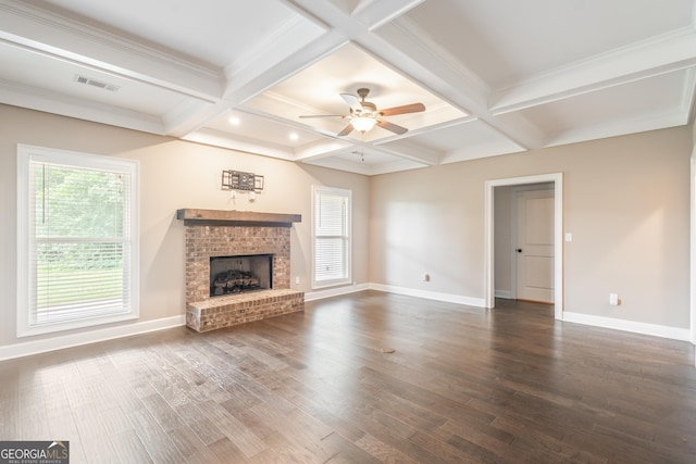 104 Bonny Oaks Dr, Lagrange, GA 30240 - unfurnished living room with a brick fireplace, dark wood-style floors, a ceiling fan, coffered ceiling, and beam ceiling