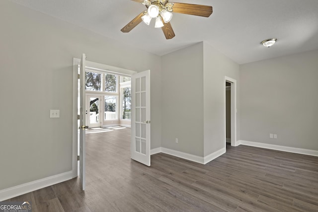 515 Youmans Rd, Midway, GA 31320 - spare room with french doors, baseboards, dark wood-style flooring, and ceiling fan