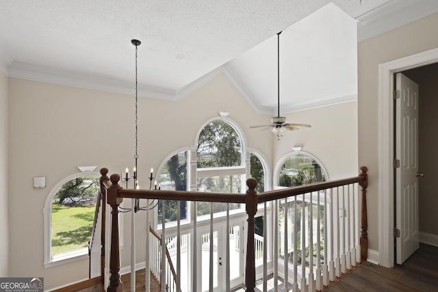 515 Youmans Rd, Midway, GA 31320 - stairs featuring a chandelier, baseboards, wood finished floors, ornamental molding, and ceiling fan