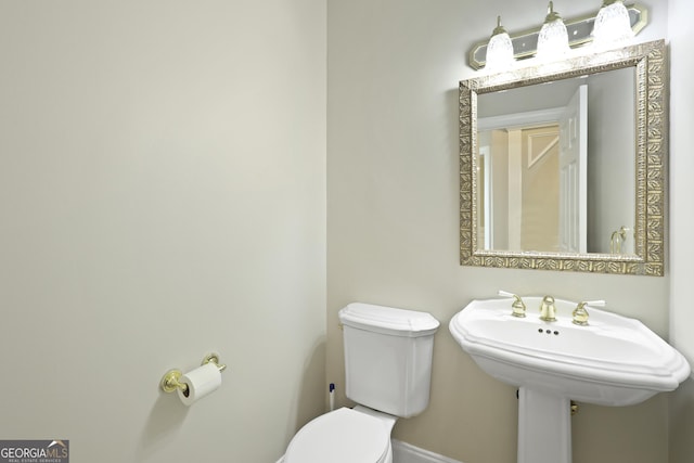 515 Youmans Rd, Midway, GA 31320 - half bath with toilet and baseboards