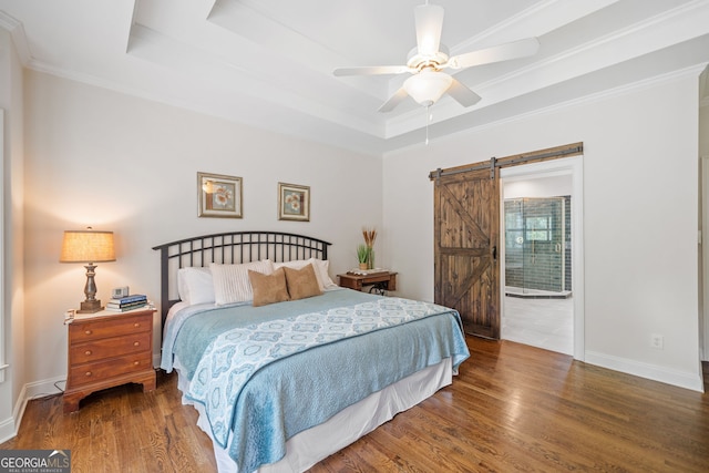 1280 Trinity Church Rd, Canton, GA 30115 - bedroom with a raised ceiling, a barn door, wood finished floors, baseboards, and ornamental molding