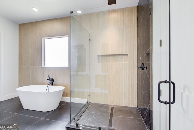 520 SW Rockbridge Rd SW, Lilburn, GA 30047 - full bathroom featuring a stall shower, a freestanding bath, recessed lighting, and tile patterned floors