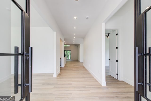 520 SW Rockbridge Rd SW, Lilburn, GA 30047 - hallway featuring light wood-style floors and recessed lighting