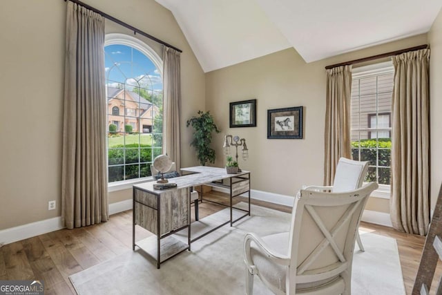 3743 Lake Edge Dr, Suwanee, GA 30024 - home office with light wood-style flooring, baseboards, and vaulted ceiling
