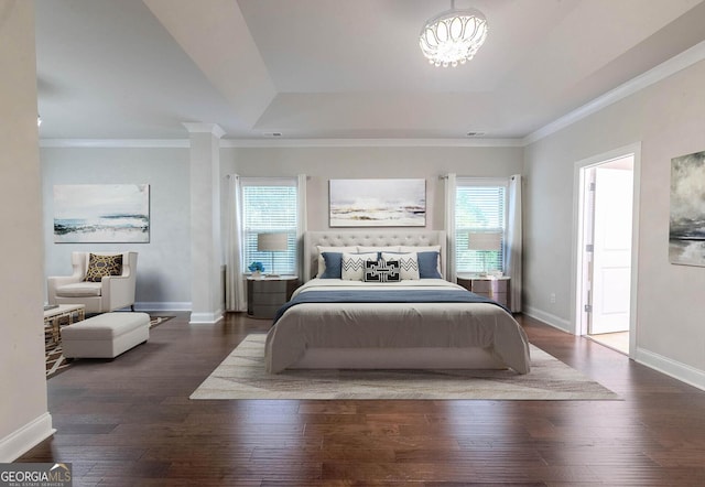 3758 Lake Haven Way, Atlanta, GA 30349 - bedroom featuring baseboards, wood finished floors, ornamental molding, a tray ceiling, and a chandelier