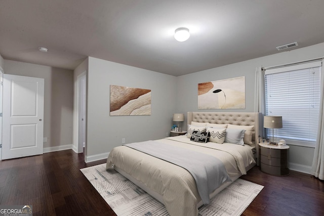 3758 Lake Haven Way, Atlanta, GA 30349 - bedroom with baseboards and wood finished floors