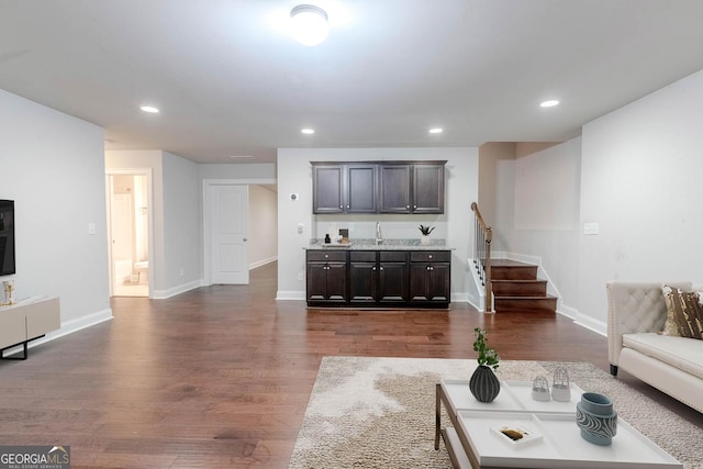 3758 Lake Haven Way, Atlanta, GA 30349 - living area with dark wood-style floors, stairway, recessed lighting, and baseboards