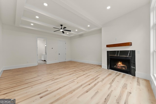 305 Etowah Cove Rd, Dahlonega, GA 30533 - unfurnished living room featuring wood finished floors, a tiled fireplace, recessed lighting, baseboards, and beamed ceiling