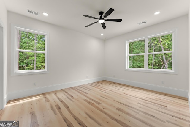 305 Etowah Cove Rd, Dahlonega, GA 30533 - spare room featuring healthy amount of natural light, light wood-style flooring, baseboards, and recessed lighting