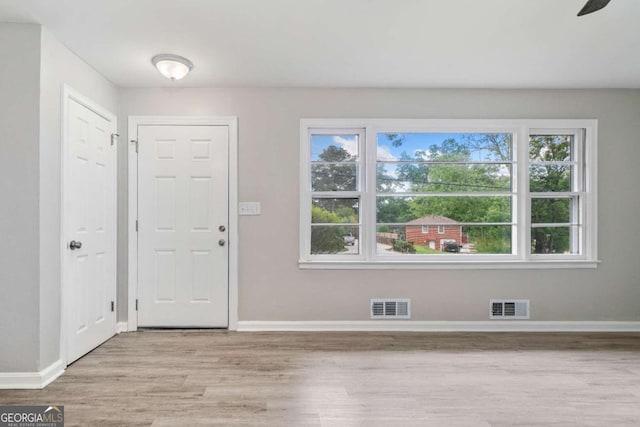2078 Olive Springs Rd SE, Marietta, GA 30060 - entrance foyer featuring light wood-style flooring and baseboards