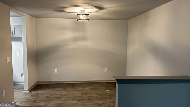 3204 Fairington Village Dr, Lithonia, GA 30038 - unfurnished dining area with wood finished floors and baseboards