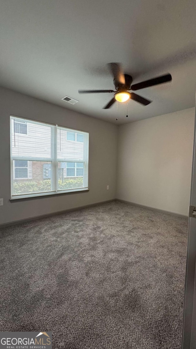 3204 Fairington Village Dr, Lithonia, GA 30038 - carpeted spare room with a ceiling fan