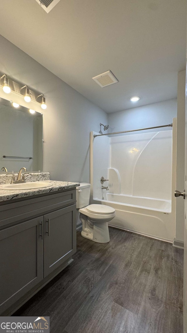 3204 Fairington Village Dr, Lithonia, GA 30038 - full bathroom with tub / shower combination, vanity, and wood finished floors