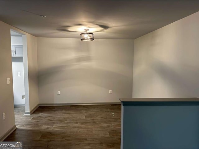 3204 Fairington Village Dr, Lithonia, GA 30038 - spare room featuring dark wood-style floors and baseboards
