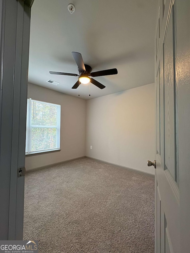 3204 Fairington Village Dr, Lithonia, GA 30038 - carpeted empty room with ceiling fan and fire sprinkler in ceiling