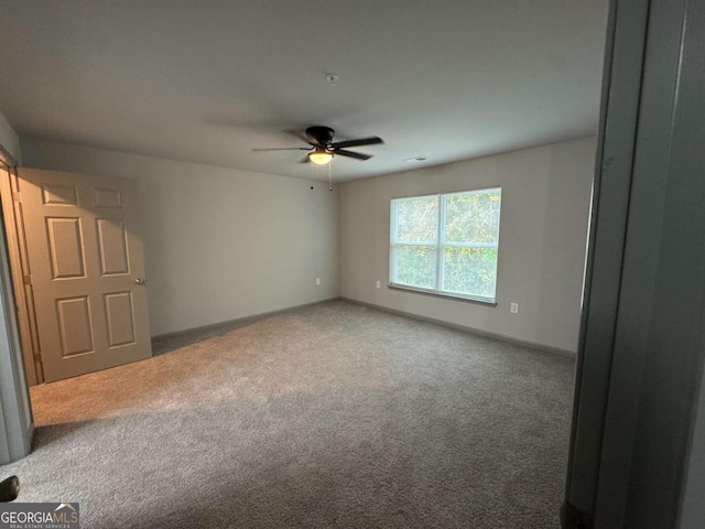 3204 Fairington Village Dr, Lithonia, GA 30038 - carpeted empty room featuring ceiling fan and baseboards