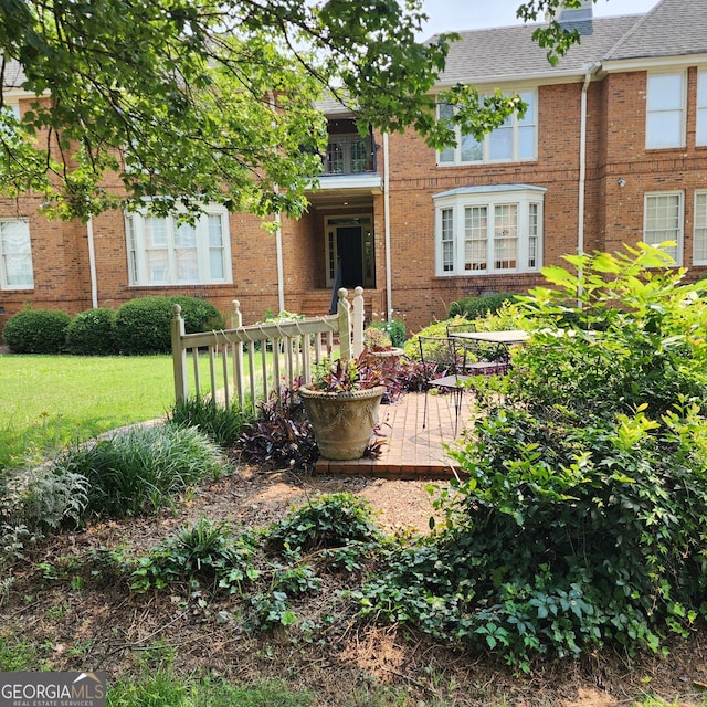 175 Corbin Ave Apt B, Macon, GA 31204 - view of front of property featuring brick siding and roof with shingles