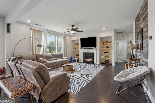 3755 Gardenside Ct, Alpharetta, GA 30004 - living area with a glass covered fireplace, a ceiling fan, wood finished floors, recessed lighting, and baseboards