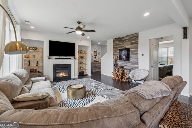 3755 Gardenside Ct, Alpharetta, GA 30004 - living area featuring a glass covered fireplace, a ceiling fan, dark wood finished floors, baseboards, and recessed lighting