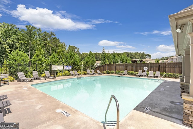 3755 Gardenside Ct, Alpharetta, GA 30004 - community pool with a patio area