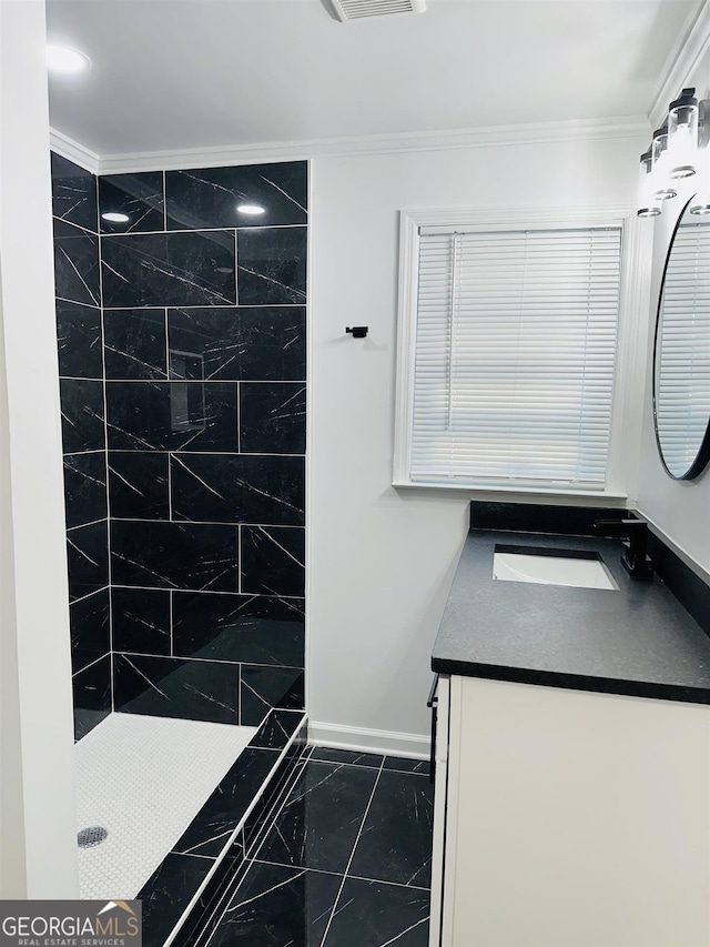 3988 Hartley Bridge Rd, Macon, GA 31216 - full bath with vanity, a tile shower, ornamental molding, and marble finish flooring