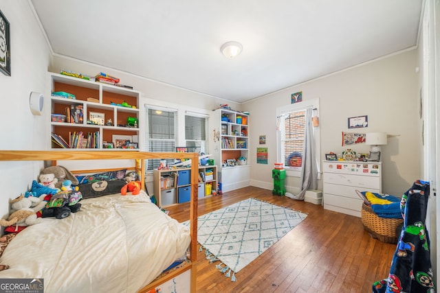 451 S Columbia Dr, Decatur, GA 30030 - bedroom featuring hardwood / wood-style floors, ornamental molding, and baseboards