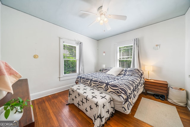 451 S Columbia Dr, Decatur, GA 30030 - bedroom featuring dark wood-style flooring, baseboards, and ceiling fan