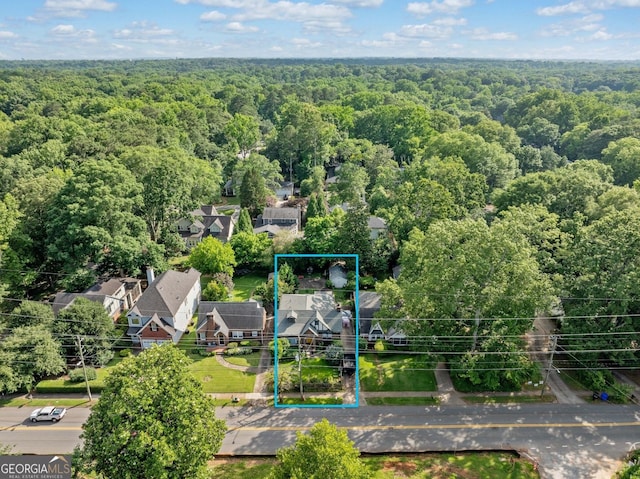 451 S Columbia Dr, Decatur, GA 30030 - aerial perspective of suburban area with a heavily wooded area and property parcel outlined