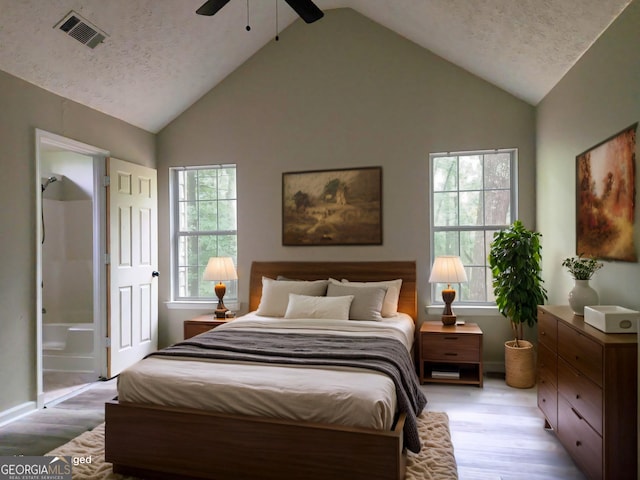 70 Priscilla Way, Newnan, GA 30265 - bedroom featuring light wood-type flooring, high vaulted ceiling, ceiling fan, baseboards, and a textured ceiling