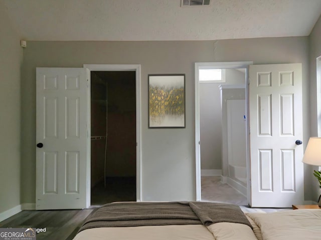 70 Priscilla Way, Newnan, GA 30265 - bedroom with a spacious closet, baseboards, and a closet