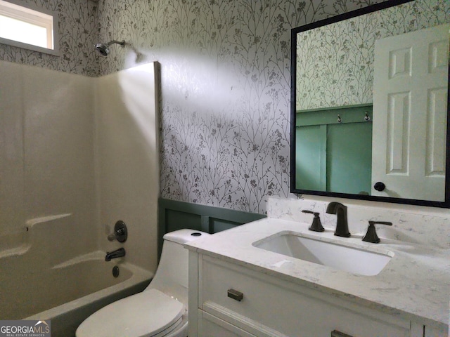 70 Priscilla Way, Newnan, GA 30265 - full bathroom featuring wallpapered walls, vanity, washtub / shower combination, and toilet