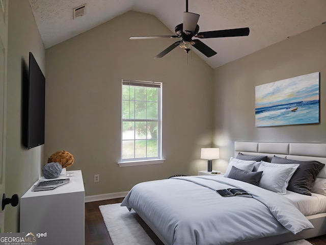 70 Priscilla Way, Newnan, GA 30265 - bedroom featuring vaulted ceiling, dark wood-style floors, baseboards, and ceiling fan