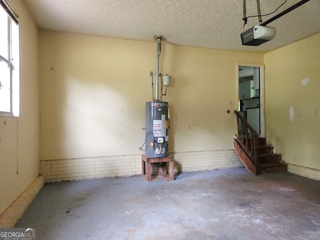 70 Priscilla Way, Newnan, GA 30265 - garage with a garage door opener and water heater