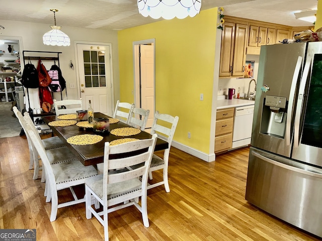 3272 Horace Rd, Bowman, GA 30624 - dining area featuring light wood-style flooring and baseboards
