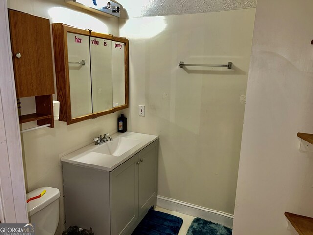 3272 Horace Rd, Bowman, GA 30624 - bathroom featuring toilet and vanity