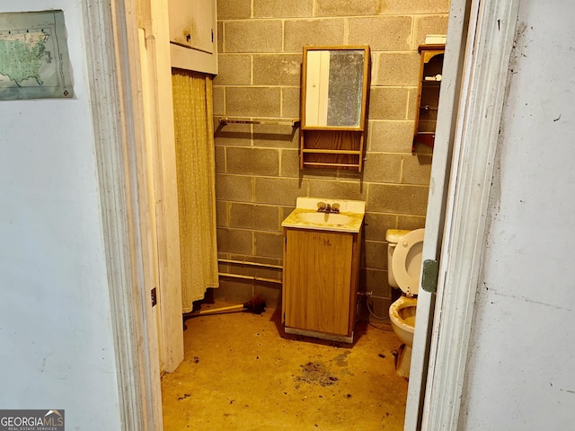 3272 Horace Rd, Bowman, GA 30624 - bathroom with toilet, concrete flooring, and vanity