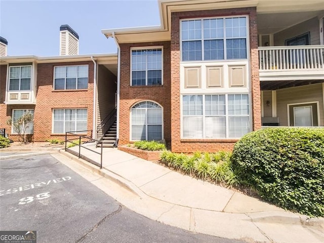 200 Renaissance Pkwy NE Unit 310, Atlanta, GA 30308 - view of property with uncovered parking