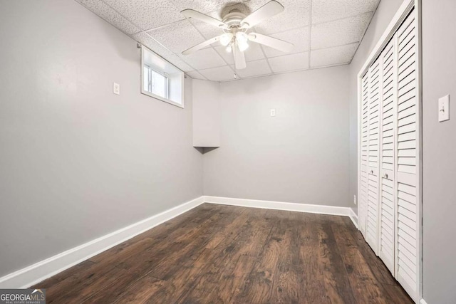 13 Cliff Ct, Villa Rica, GA 30180 - basement featuring a paneled ceiling, dark wood finished floors, and ceiling fan