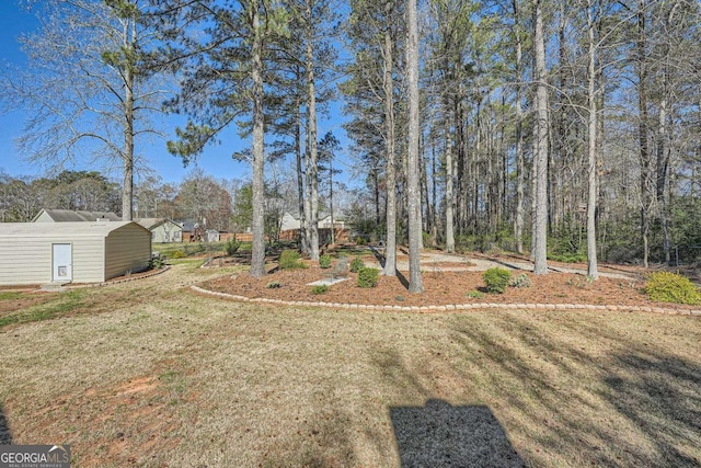13 Cliff Ct, Villa Rica, GA 30180 - view of grassy yard featuring an outbuilding