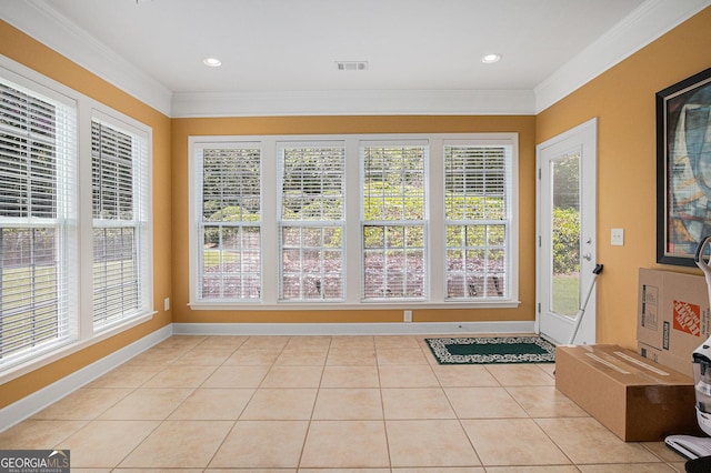 4445 Vanadium Bnd, Cumming, GA 30040 - entryway with crown molding, light tile patterned floors, and baseboards