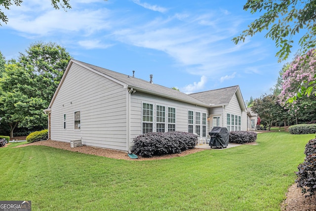 4445 Vanadium Bnd, Cumming, GA 30040 - rear view of house featuring a yard