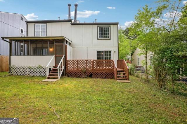 2049 Charter Ln, Lithonia, GA 30058 - back of property with a sunroom, a fenced backyard, and a wooden deck
