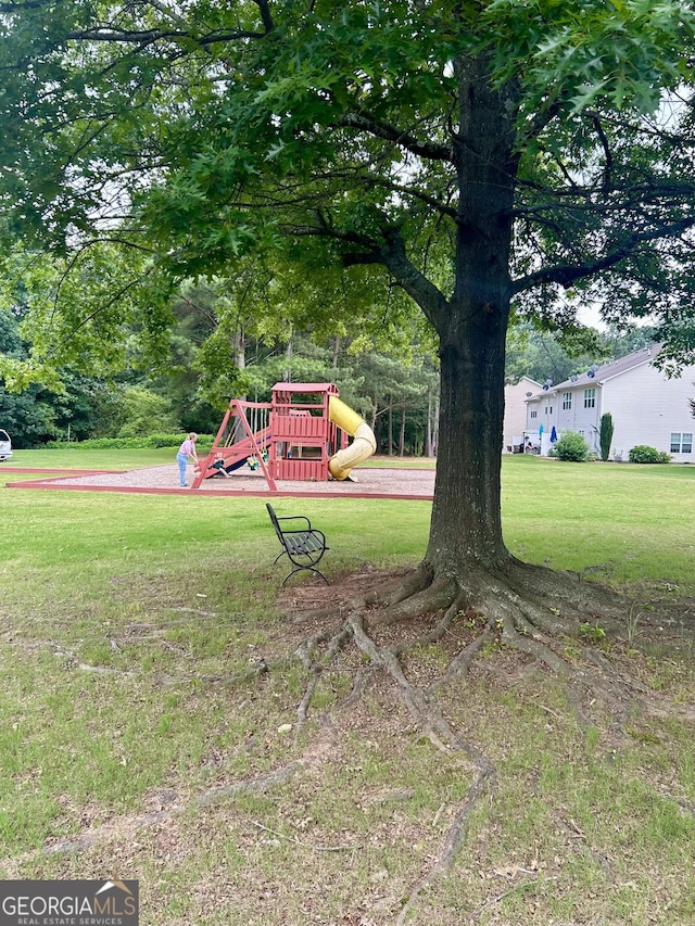 4863 Beacon Ridge Ln, Flowery Branch, GA 30542 - view of grassy yard featuring a playground