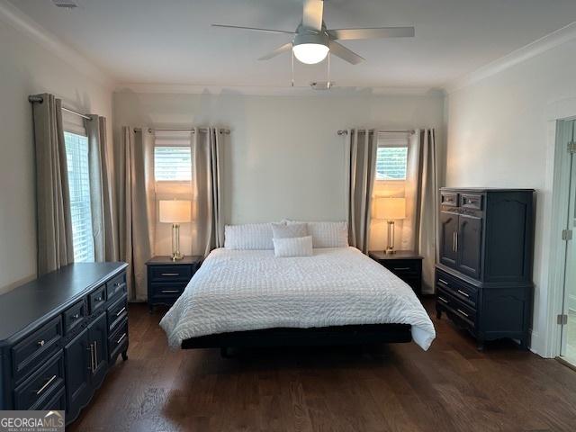 663 Oglethorpe Ave, Athens, GA 30606 - bedroom with dark wood-style floors, ornamental molding, and ceiling fan