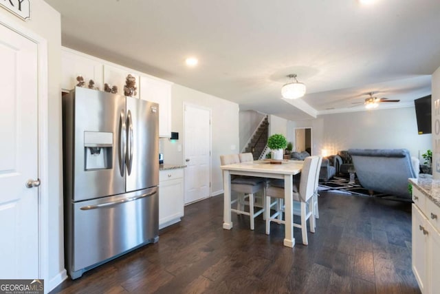3126 Cove View Ct, Dacula, GA 30019 - kitchen with stainless steel refrigerator with ice dispenser, dark wood-type flooring, white cabinets, light stone countertops, and open floor plan