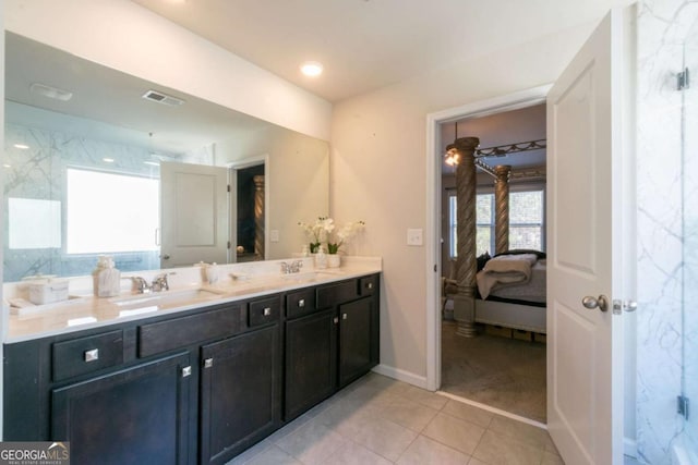3126 Cove View Ct, Dacula, GA 30019 - full bath with ensuite bathroom, double vanity, plenty of natural light, and tile patterned floors