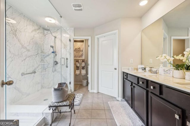 3126 Cove View Ct, Dacula, GA 30019 - full bath with a marble finish shower, double vanity, and tile patterned floors