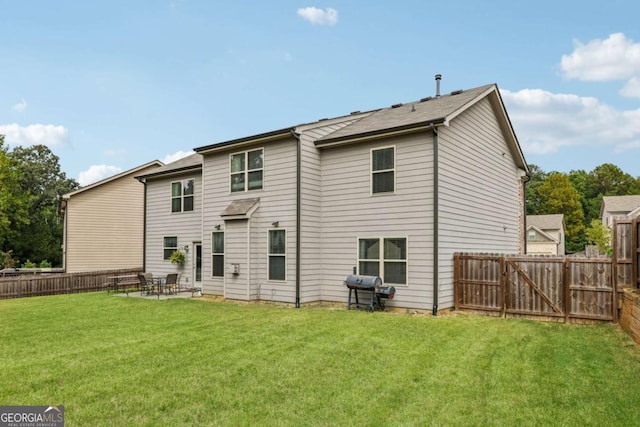 3126 Cove View Ct, Dacula, GA 30019 - back of house featuring a fenced backyard and a patio area