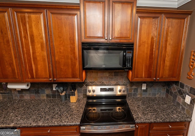 219 Periwinkle Way, Pendergrass, GA 30567 - kitchen featuring black microwave, stainless steel range with electric cooktop, tasteful backsplash, brown cabinetry, and dark stone countertops